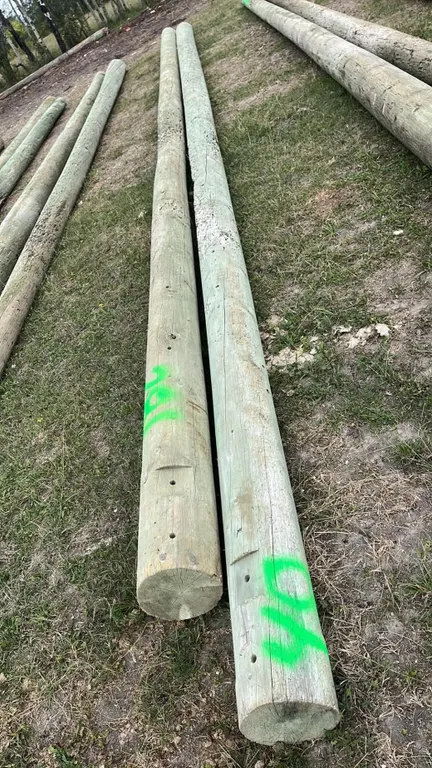 OFFSITE - 2 hydro poles, 40’ long each.