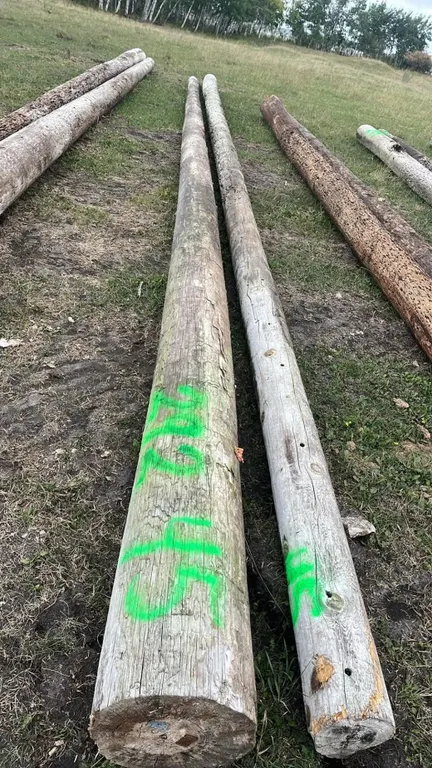 OFFSITE - 2 hydro poles, 42’ long each.