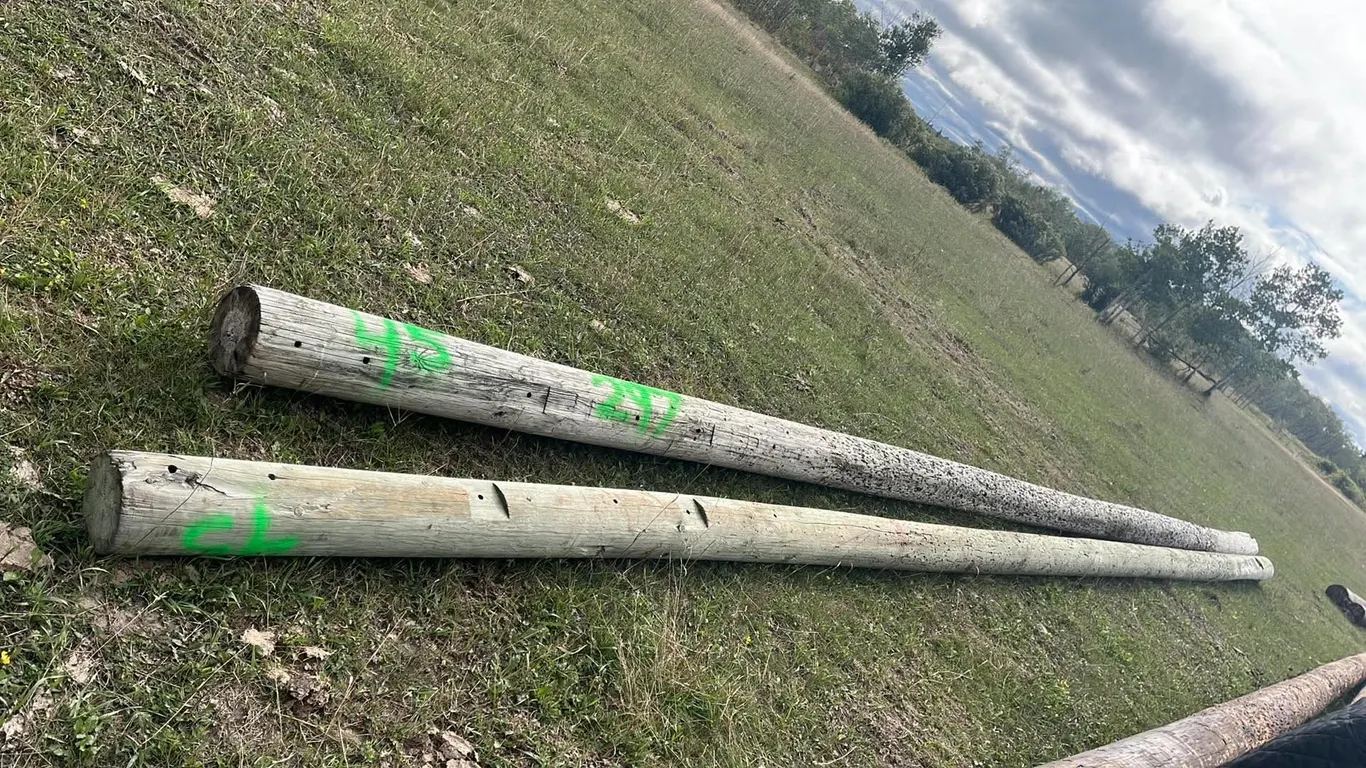 OFFSITE - 2 hydro poles, 45’ long each