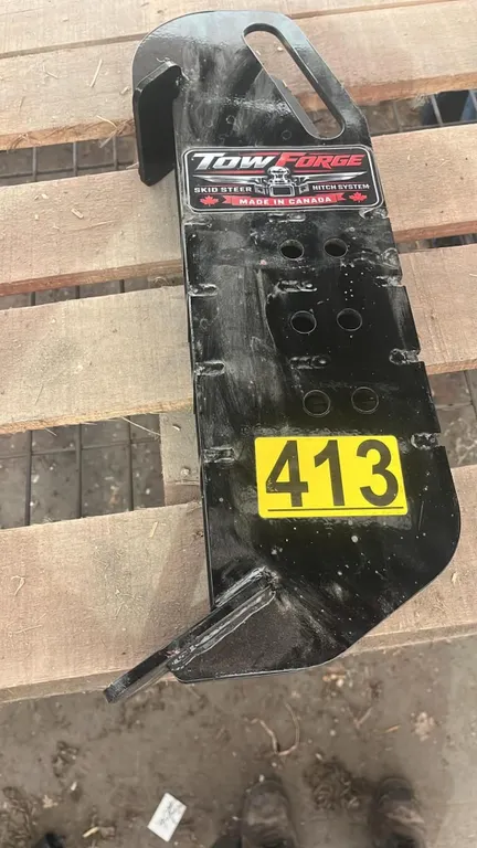 OFFSITE - Skid steer adapter with 3 receiver height positions .