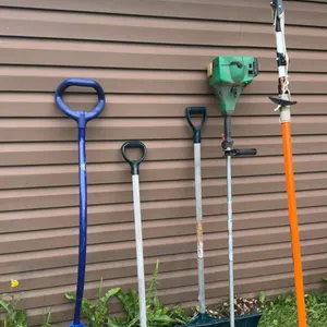 Three Snow Shovels, Gas String Trimmer, and Pole Pruner Saw