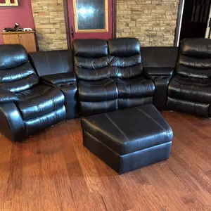 Black Faux Leather Manual Recliner Sectional With Storage Ottoman And Cup Holders