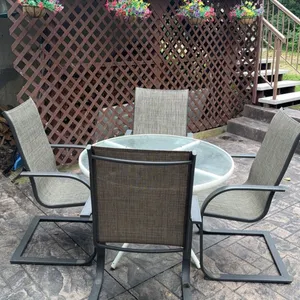 Outdoor Patio Set with Glass Table and Four Metal Sling Chairs