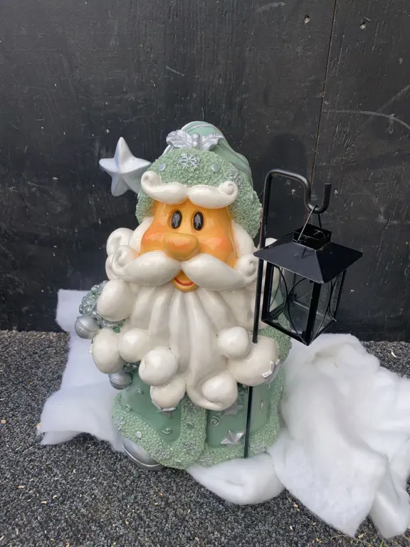 Santa Claus Ceramic Figurine With Green Outfit and Lantern
