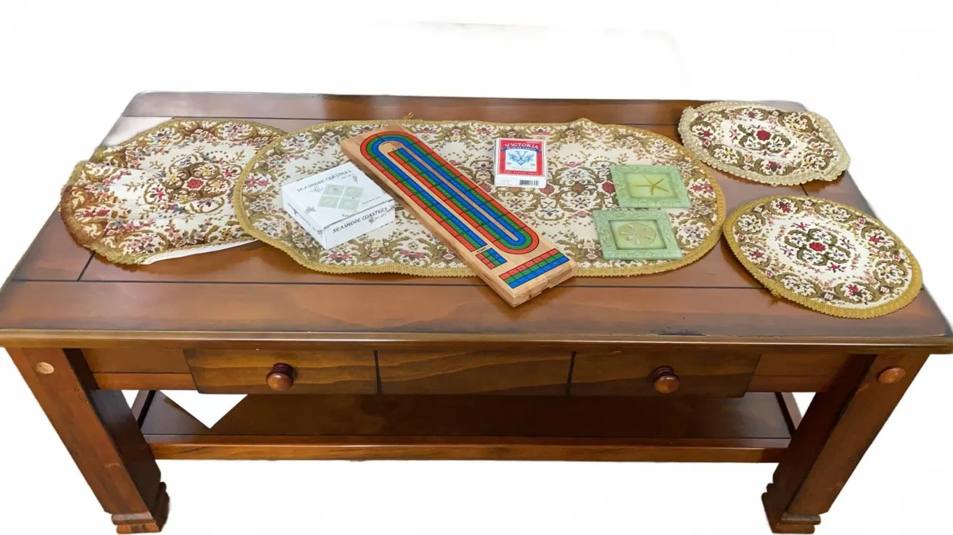Wood Coffee Table With Drawer, Cribbage Board, Cards, Doilies, and Coasters