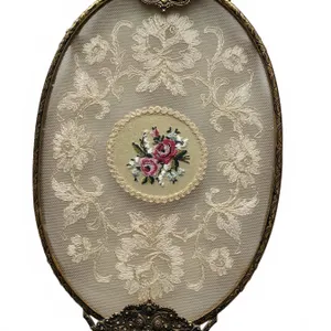 Oval Brass-Framed Embroidered Mesh Panel With Floral Motif