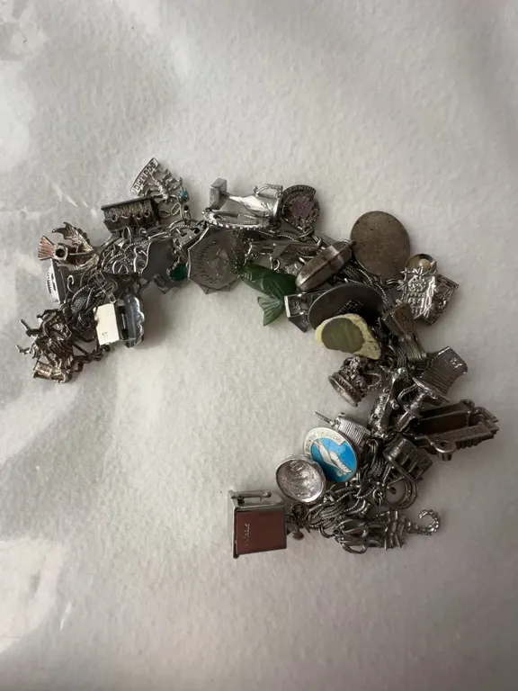 Sterling Silver Charm Bracelet with All Sterling Charms, 128g Total Weight