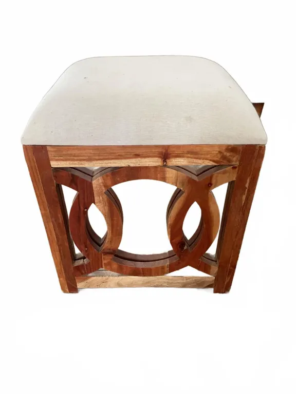 Wooden Ottoman with Geometric Cutout Base and Cushioned Seat