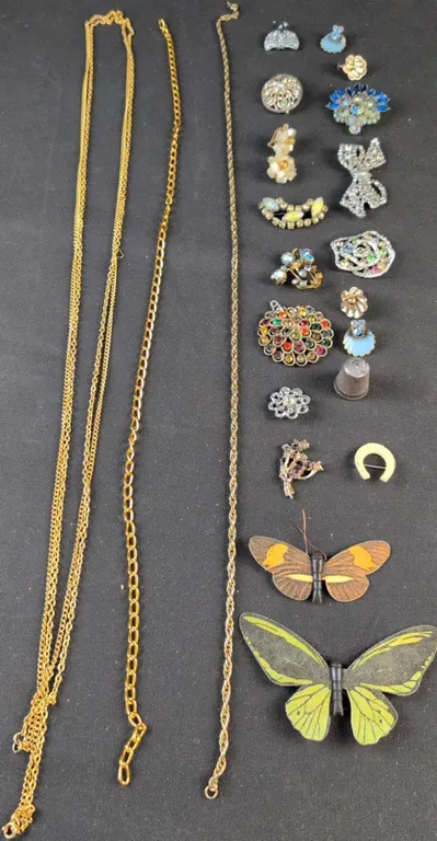 Costume Jewelry Lot With Chains, Brooches, Earrings, and Pins