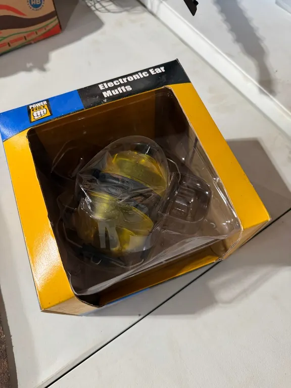 Unused electric ear muffs, timer, little buddy heater, snow brush (GST 5 % charged)