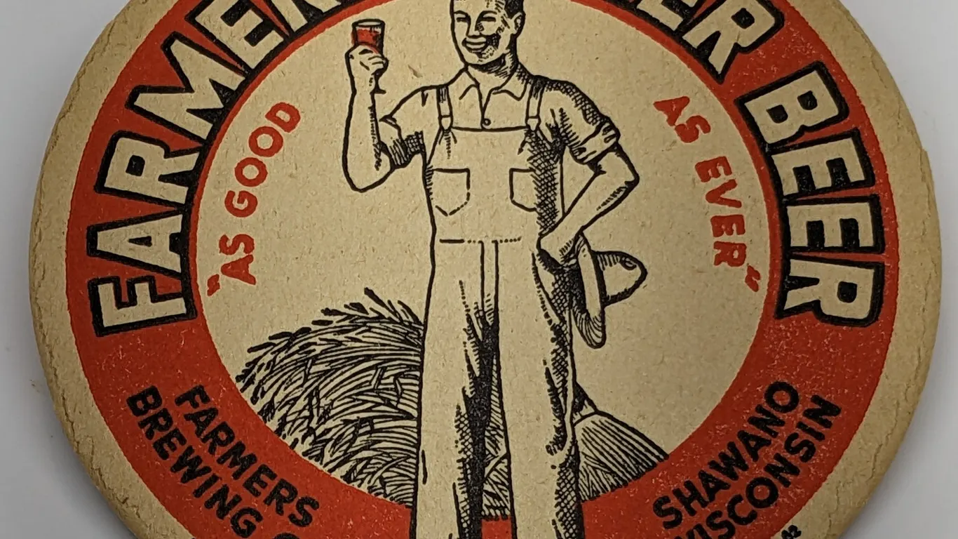 FARMERS LAGER BEER COASTER SHAWANO WISCONSIN (ABSORBO)
