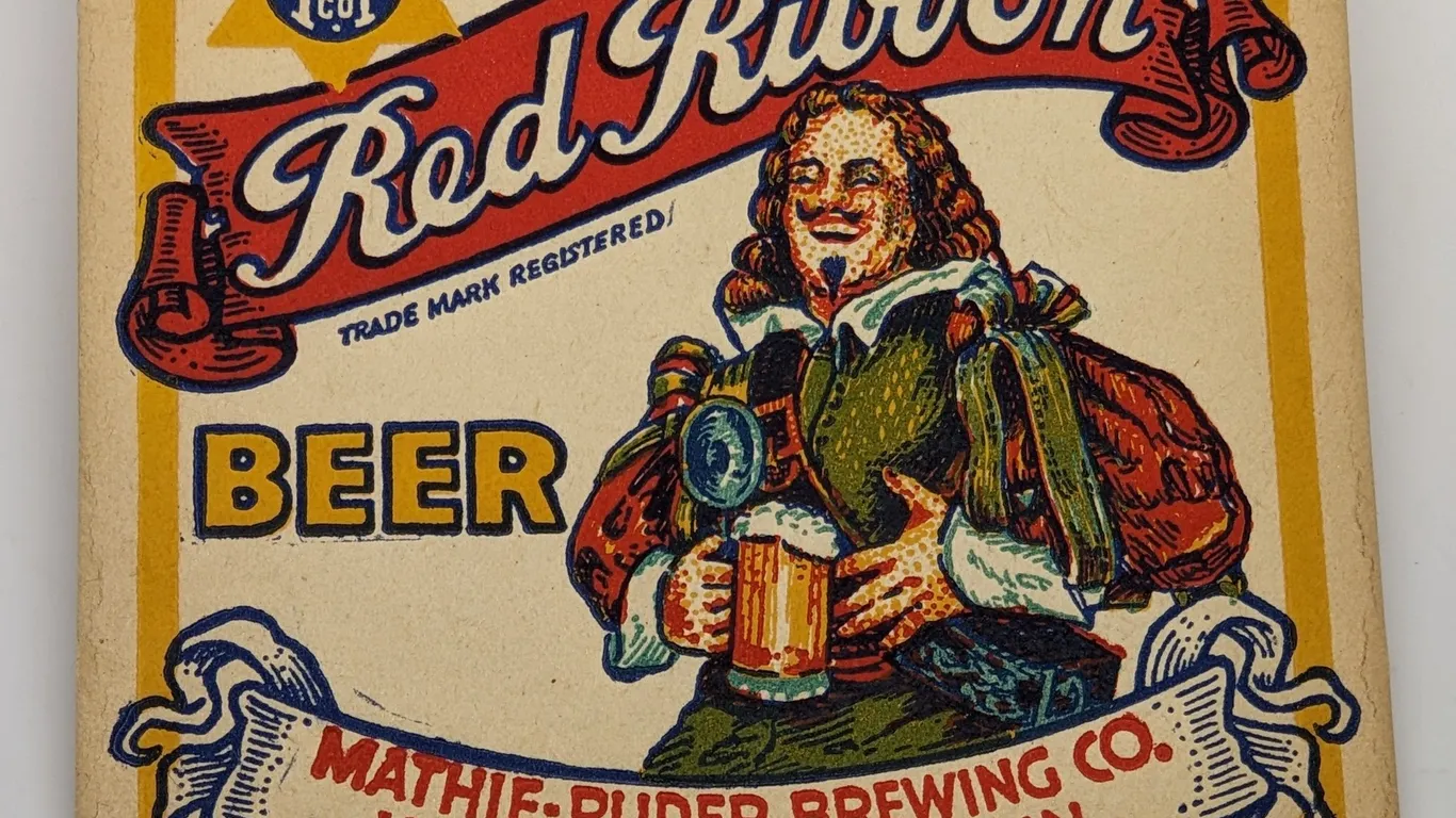 RED RIBBON BEER COASTER MATHIE RUDER BREWING WAUSAU WISCONSIN (ABSORBO)