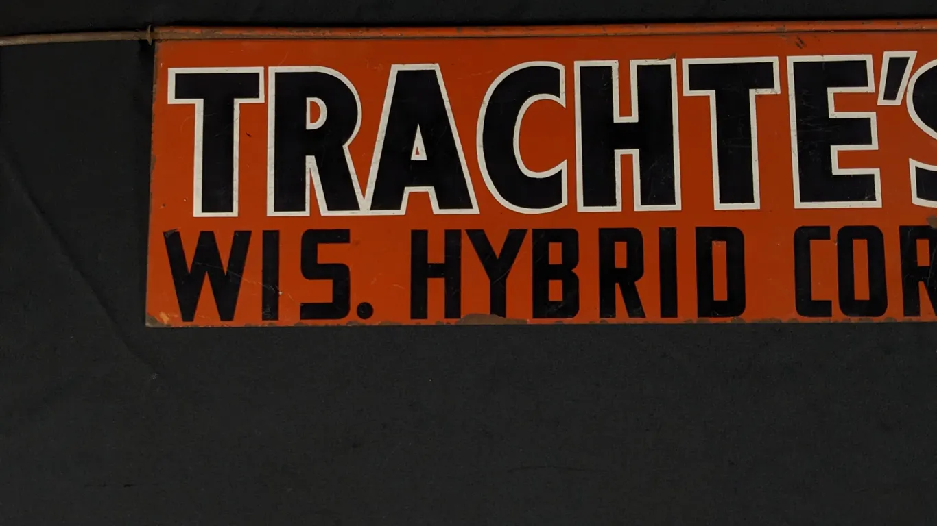 TIN SWINGER SIGN TRACHTE'S WIS HYBRIDE CORN (WISCONSIN) (2 SIDED)