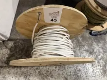 SPOOL OF FLAT WHITE ELECTRICAL CABLE
