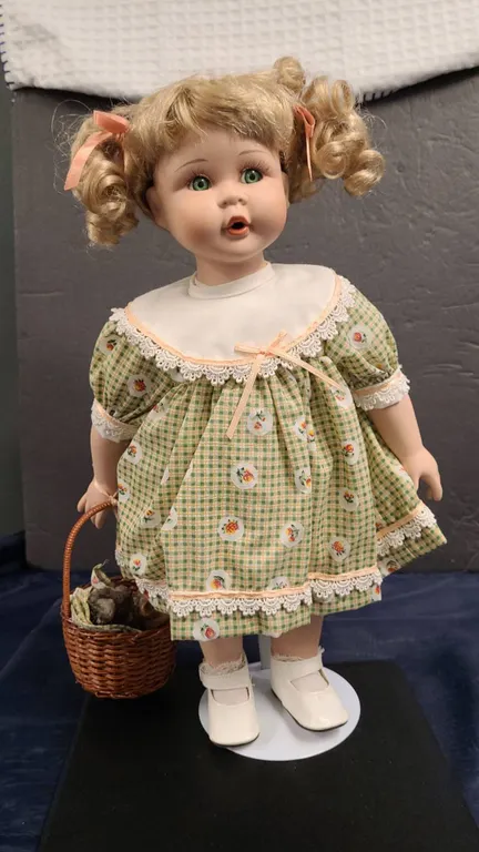 Blonde Porcelain Girl Doll in Green Dress with Kitten Basket
