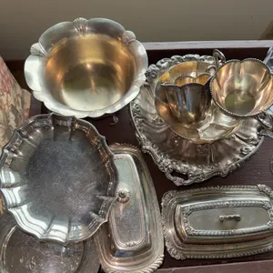Silver bowls and butter dishes