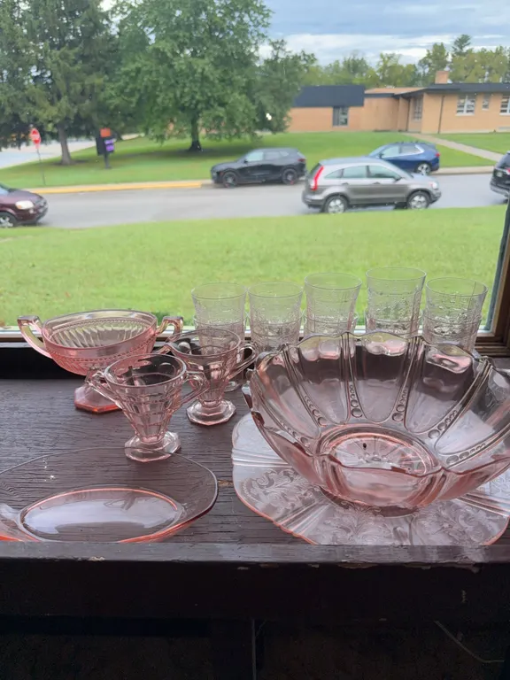 Pink glass bowls and cups