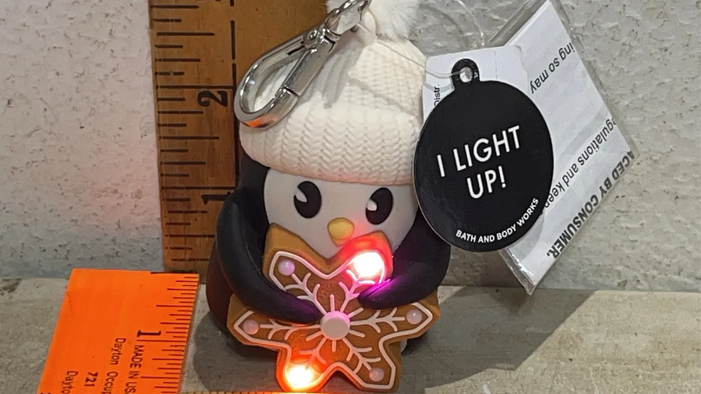Bath & Body Works Light Up Penguin Pocketbac/Hand Sanitizer Holder Keychain