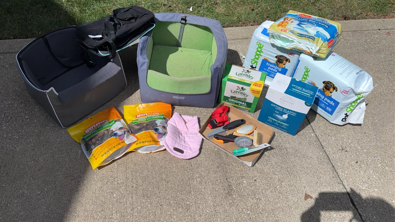 Pet Supply Lot: Dog Car Seats, Treats, Training Pads, Grooming Tools