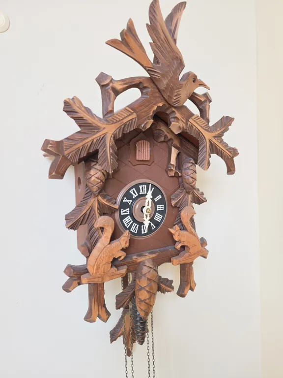 Black Forest Style Carved Cuckoo Clock with Squirrels and Pine Cones
