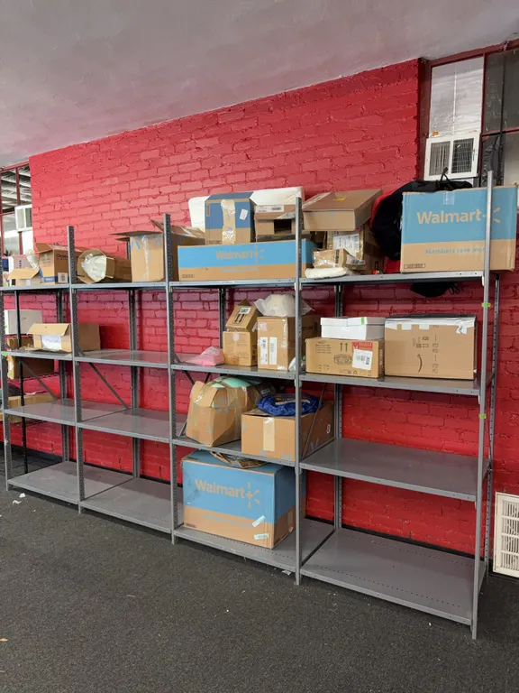 Large metal shelf with contents