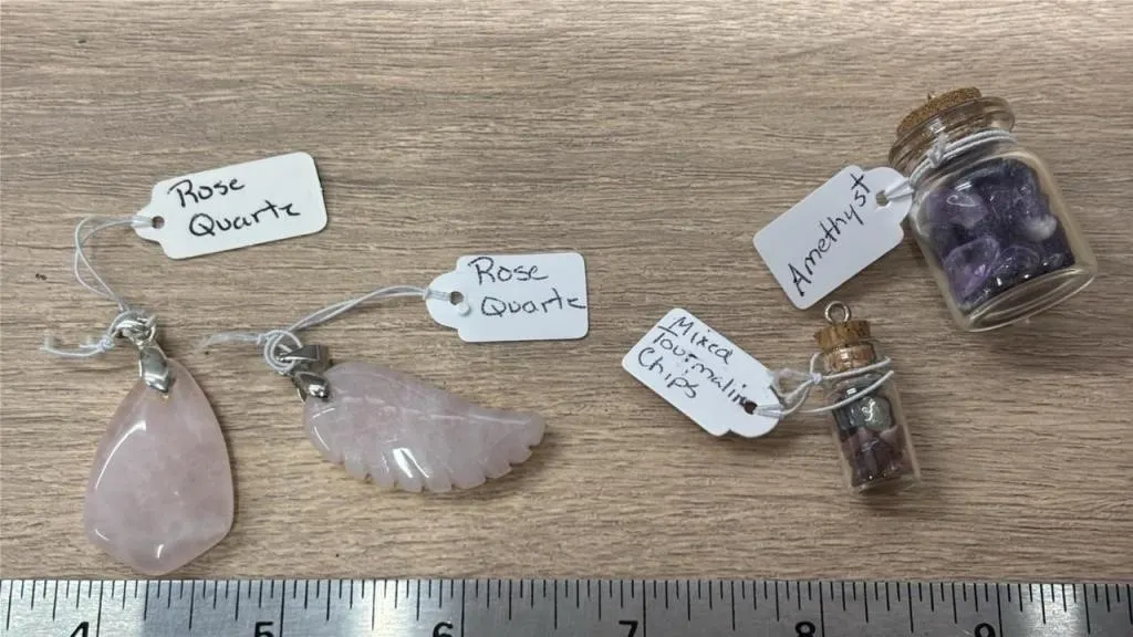 4 Stone Pendants. *SC