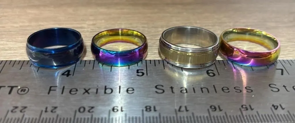 4 Asst. Size Metal Rings. *SC