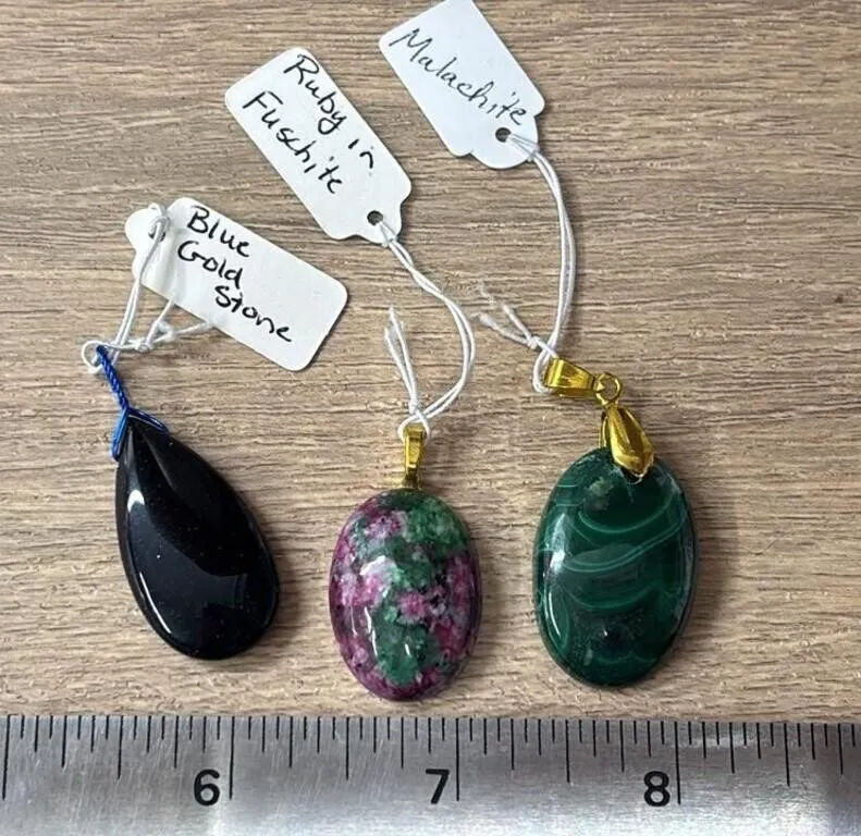 3 Crystal Pendants. *SC