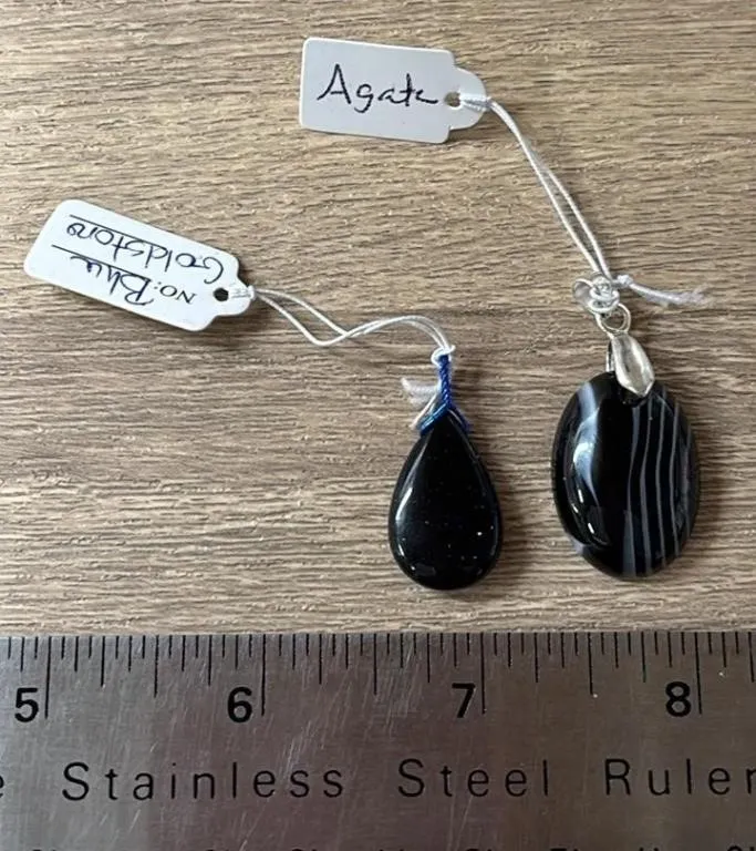 2 Crystal Pendants. *SC