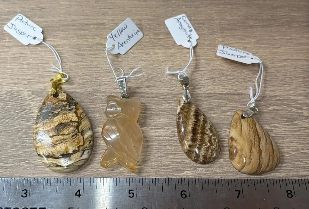 4 Crystal Pendants. *SC