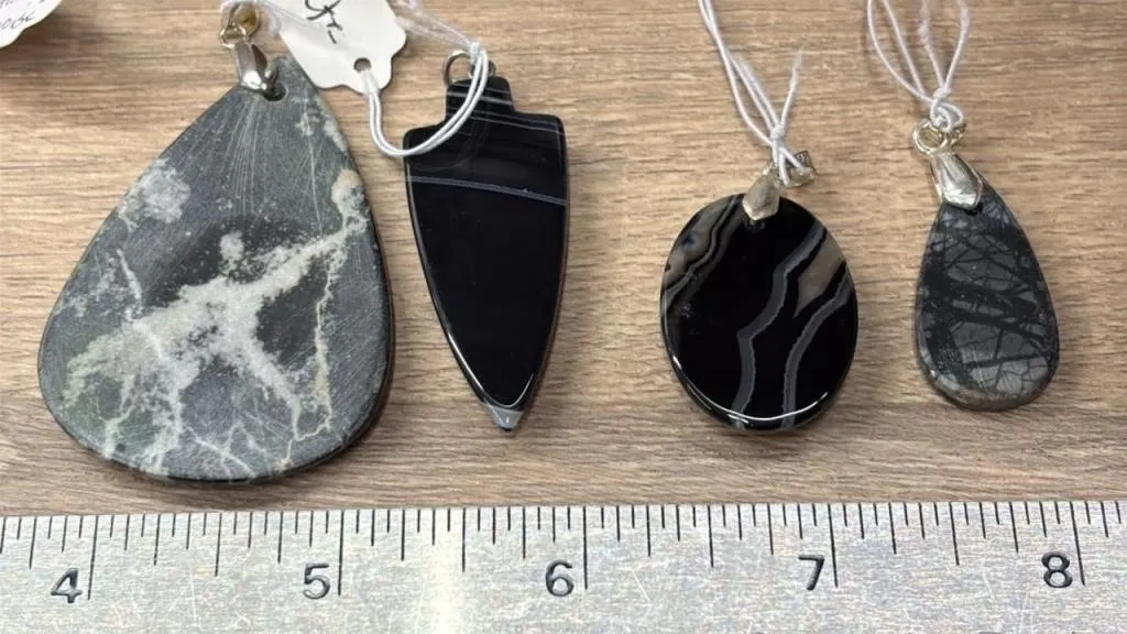 4 Crystal Pendants. *SC