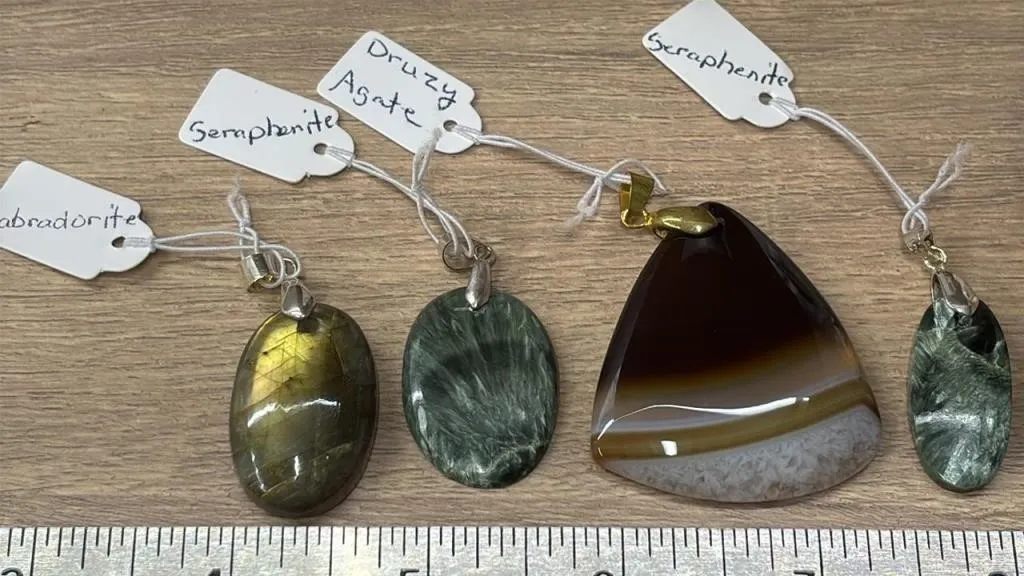 4 Crystal Pendants. *SC