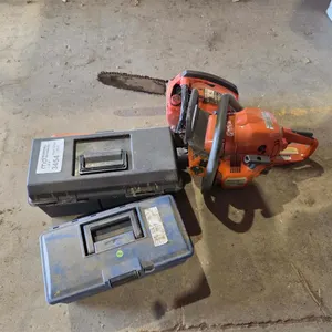 Homelite XL & Husqvarna Chainsaws & (2) Empty Cases
 UNRESERVED