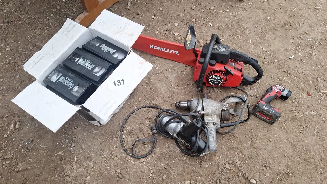Black and Decker drill, Vhs tapes,
Milwaukee flashlight,
Homelite chainsaw and
1/2" Drive drill, Millers Falls impact