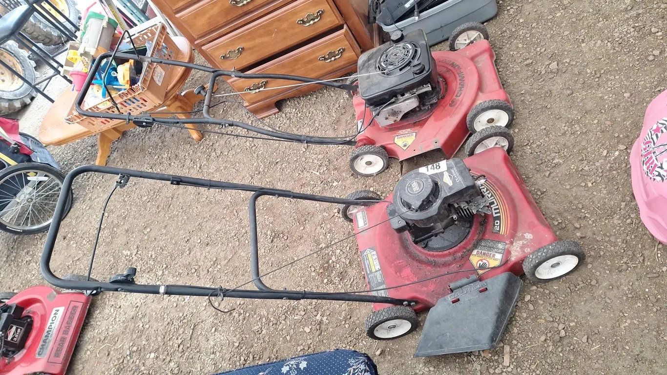 2-Push gas lawnmowers. 1-Champion, 1-20" Murry 3.5Hp