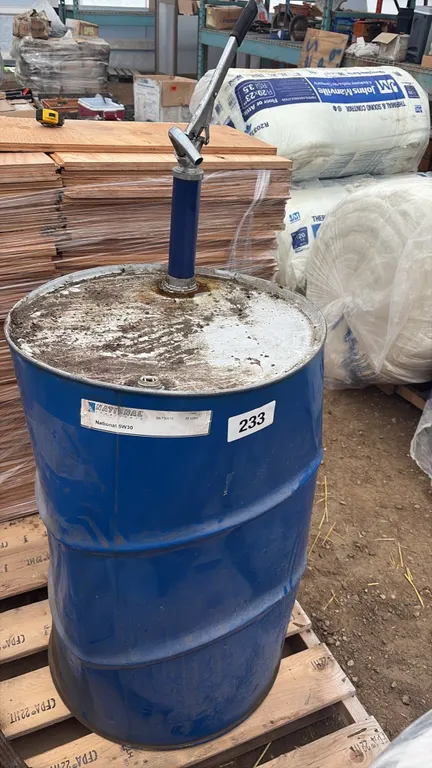 Aproximatly half barrel of Motor oil 5W-30 with pump