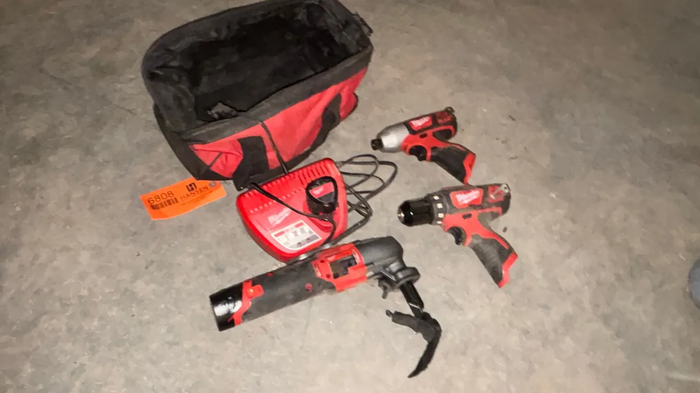 (2) Milwaukee M12 Cordless Drills and (1) Nibbler