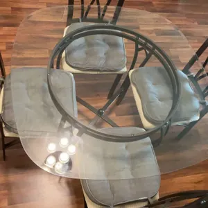 Glass Top Dining Table With Four Metal Chairs And Cushions