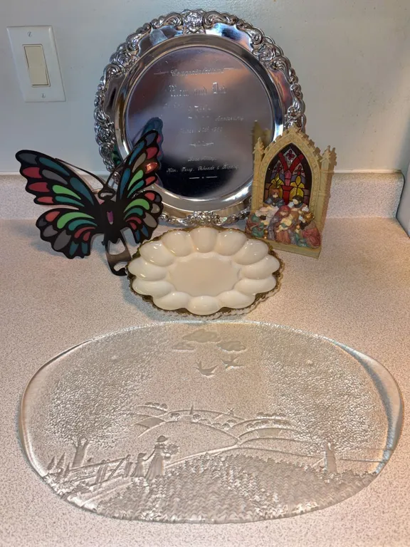Decorative Lot: Embossed Glass Platter, Milk Glass Egg Plate, Candle Holders, and Engraved Tray