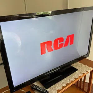 RCA 47-Inch FHD LED TV with Arris DCX3200 Set-Top Box and Stand