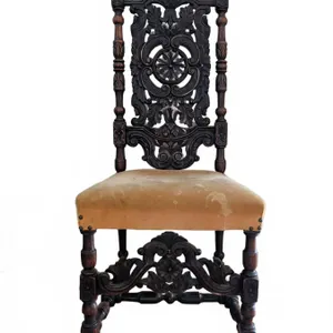 Dark Wood Side Chair With Ornate Carved Back and Tan Upholstered Seat