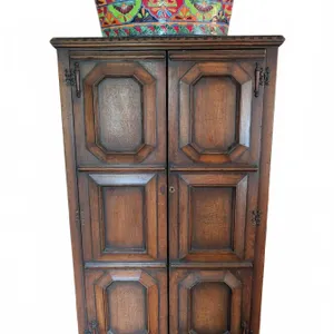 Solid Oak Wardrobe Armoire with Ornate Front Panels and Brass Hardware