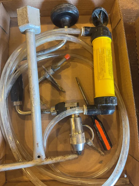 Hand Pump, Speed Wrench, and Misc Tools