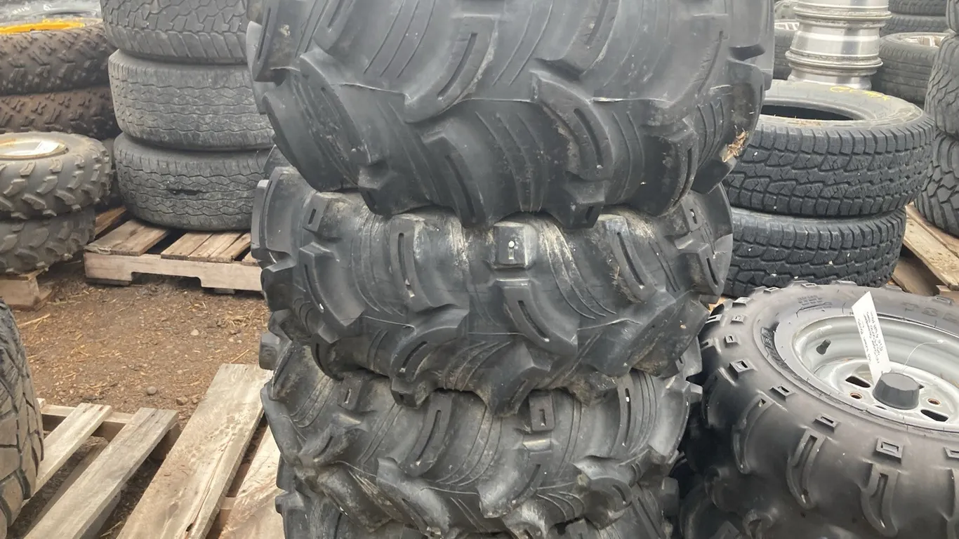 (2) Kenda Executioner AT26x10-12 and (2) Kenda Executioner AT26x12-12 with 4 Bolt Rim