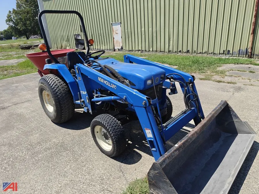 New Holland Tractor with Attachments