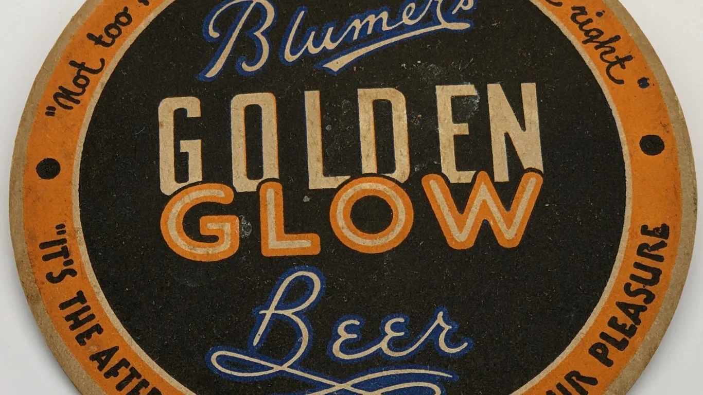 BLUMER'S GOLDEN GLOW BEER COASTER MONROE WISCONSIN