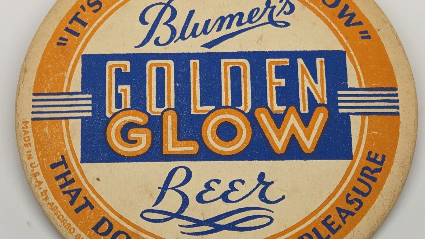 BLUMER'S GOLDEN GLOW BEER COASTER MONROE WISCONSIN