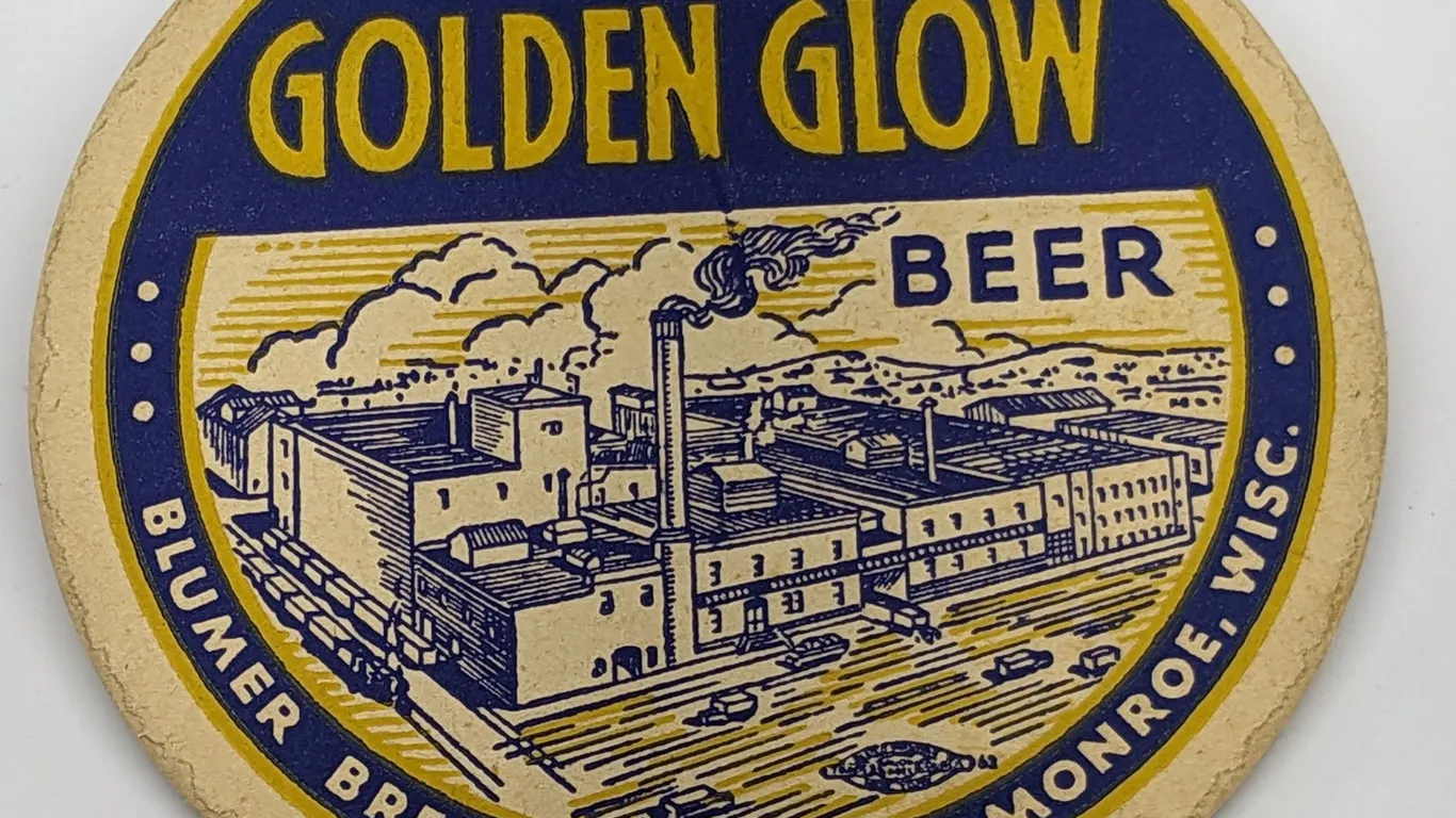 GOLDEN GLOW BEER COASTER BLUMER BREWING MONROE WISCONSIN