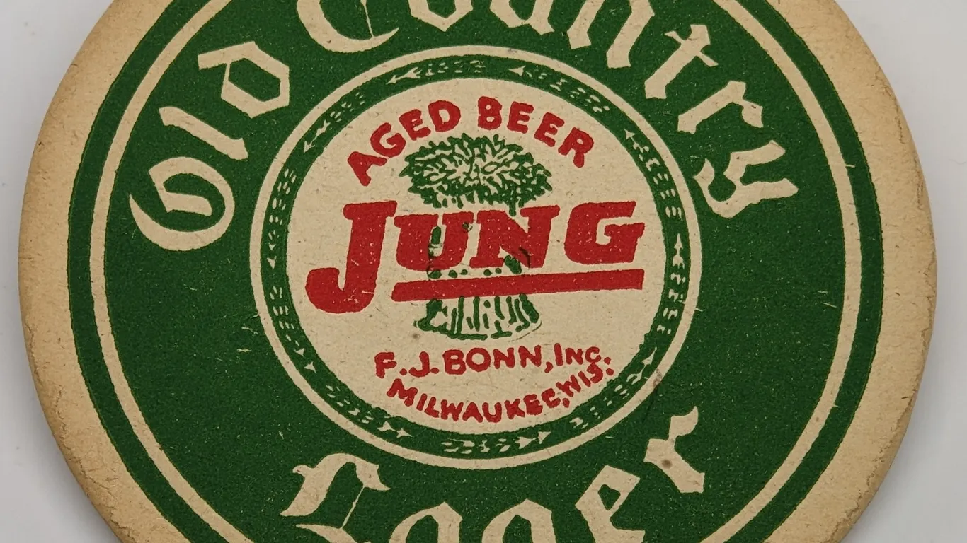 OLD COUNTRY LAGER BEER COASTER F.J. BONN MILWAUKEE WISCONSIN