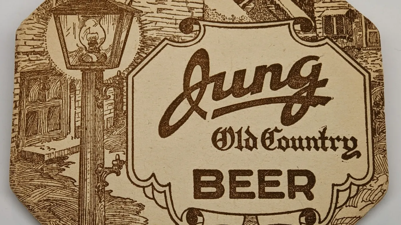 JUNG OLD COUNTRY BEER COASTER RANDOM LAKE WISCONSIN
